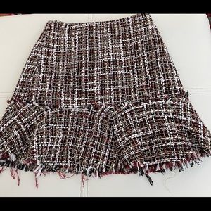 Cute Tweed mini skirt. Multi colored tweed skirt by Francesca’s.